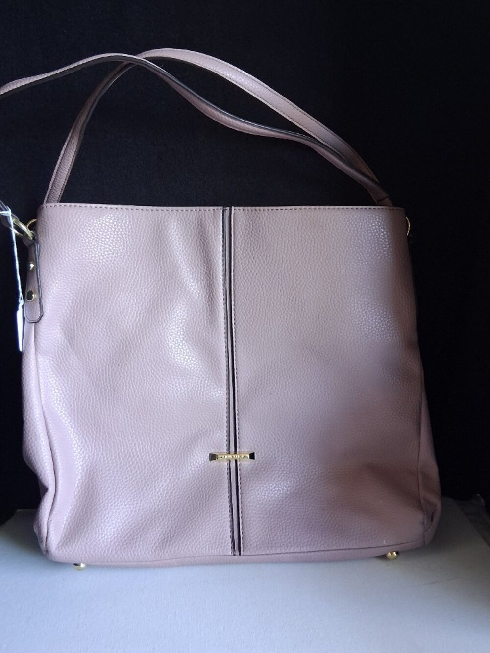Annie Klein Mauve color bag. With a triple compartment interior gold Hardware NW